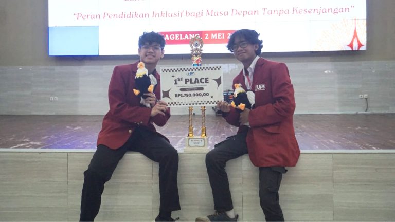 The winning synergy: Aldo Pranata Soeriakartalegawa and Andre Reyvaldo Iglesias of "Team Nonchalant" celebrate their 1st Place victory at the National Tidar Debating Competition 2026.